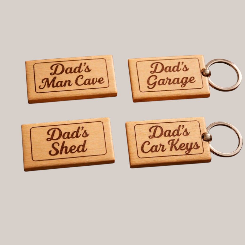 Personalised wooden keyring engraved with custom text on a smooth double‑sided wood design, ideal for birthday occasions 