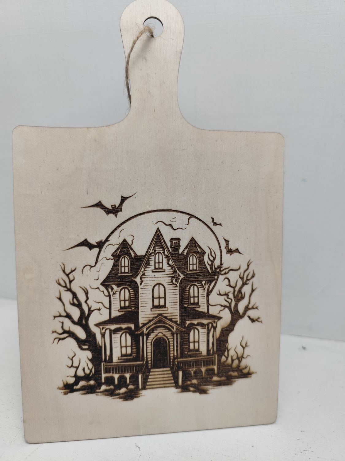 Personalised Engraved Haunted Homestead Wooden Plaque – Custom Image or Text Personalised laser engraved Halloween wooden sign with haunted house and bats design, natural wood with jute twine hanger