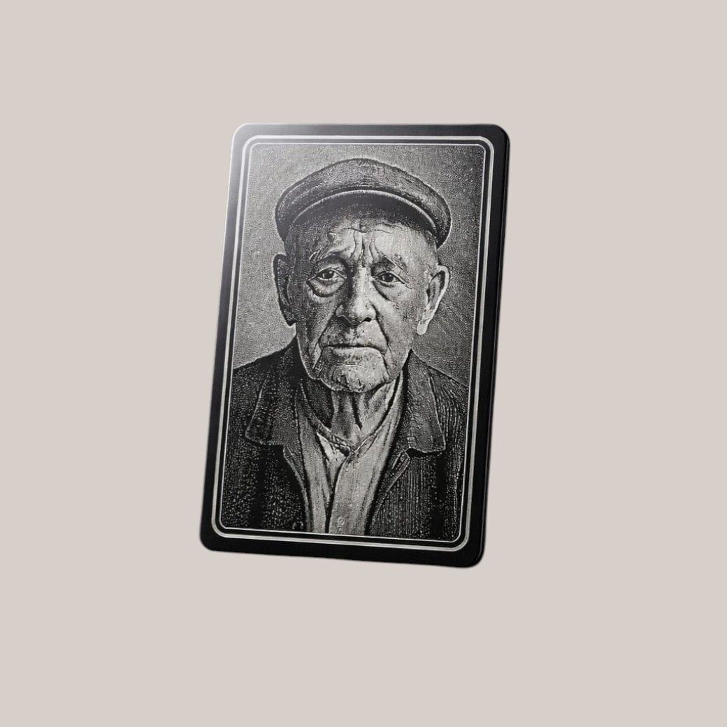 Anodized aluminium wallet card with engraved portrait photo and first name for secure identification