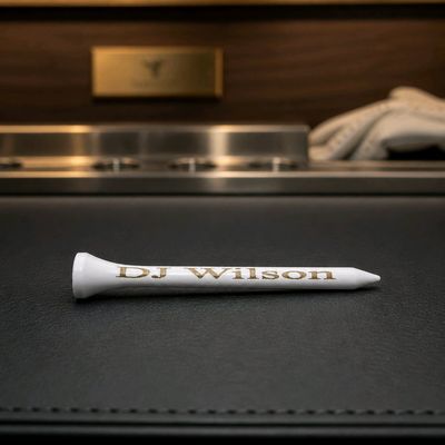 Personalised 70mm Golf Tees – Custom Engraved Wooden Tees Personalised 70mm wooden golf tees with engraved funny quotes or custom text, available in light brown or white colours.