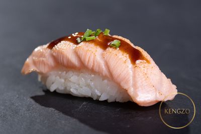 58. Flamed Sake Nigiri