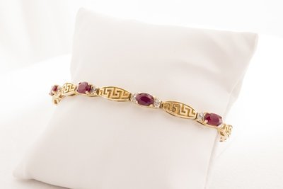 14 Karat Yellow Gold ruby And Diamond Bracelet.