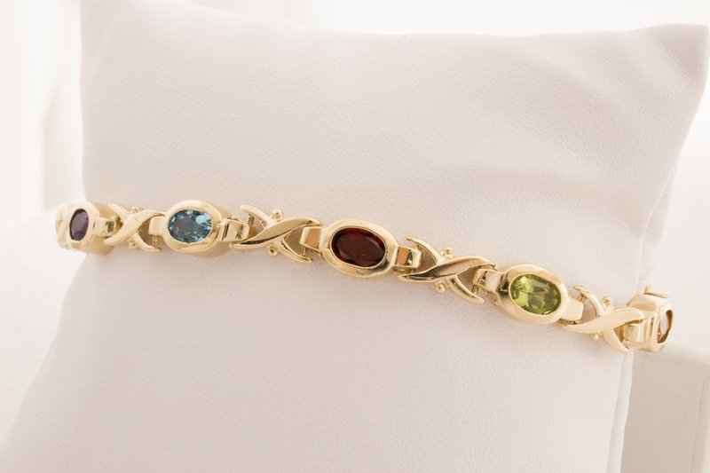 14 Karat Yellow Gold Multi Color Bracelet. 14 Karat Yellow Gold Multi Color Bracelet.