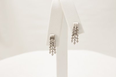 14 Karat White Gold Diamond Earring.