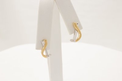 18 Karat White And Yellow Gold Diamond Earrings.