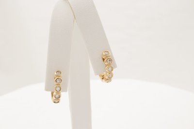 14 Karat Yellow Gold Hoop Diamond Earrings.