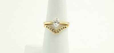 18 Karat Yellow Gold Engagement Ring.