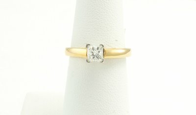 14 Karat Yellow Gold Solitaire Diamond Engagement Ring.