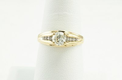 10 Karat Yellow Gold Diamond Engagement Ring.
