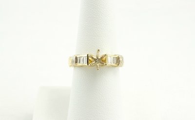 14 Karat Yellow Gold Engagement Ring.