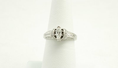 18 Karat White Gold Diamond Engagement Ring.