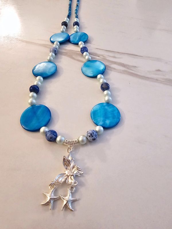 Big blue circle stones with pearls and blue beads