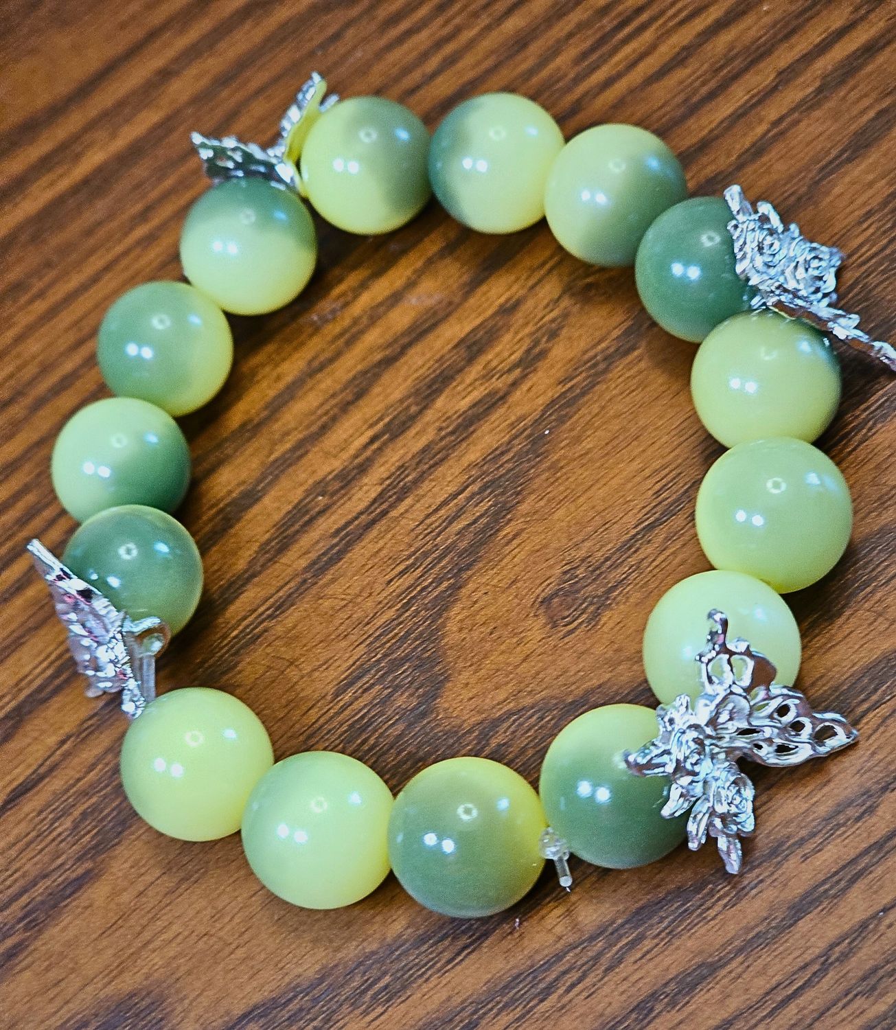 Green bodhi with beautiful butterfly spacers