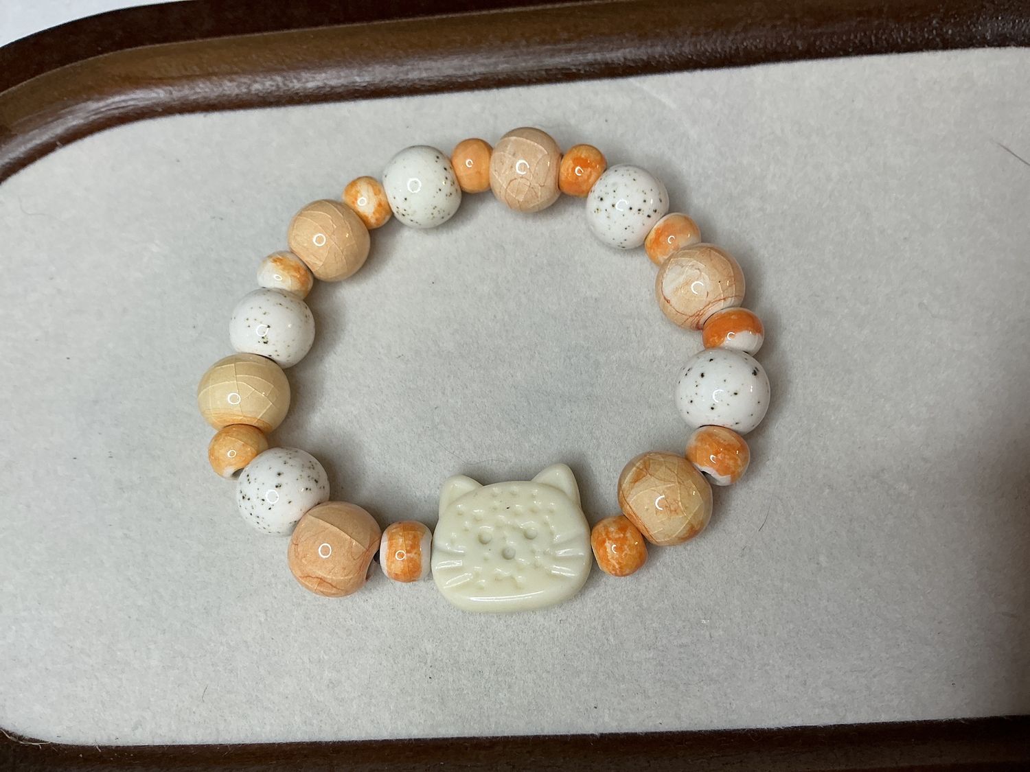 Orange cat bracelet