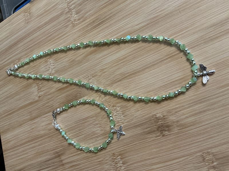 Green Cubs and Green Hematite and dragon fly charm with matching bracelet