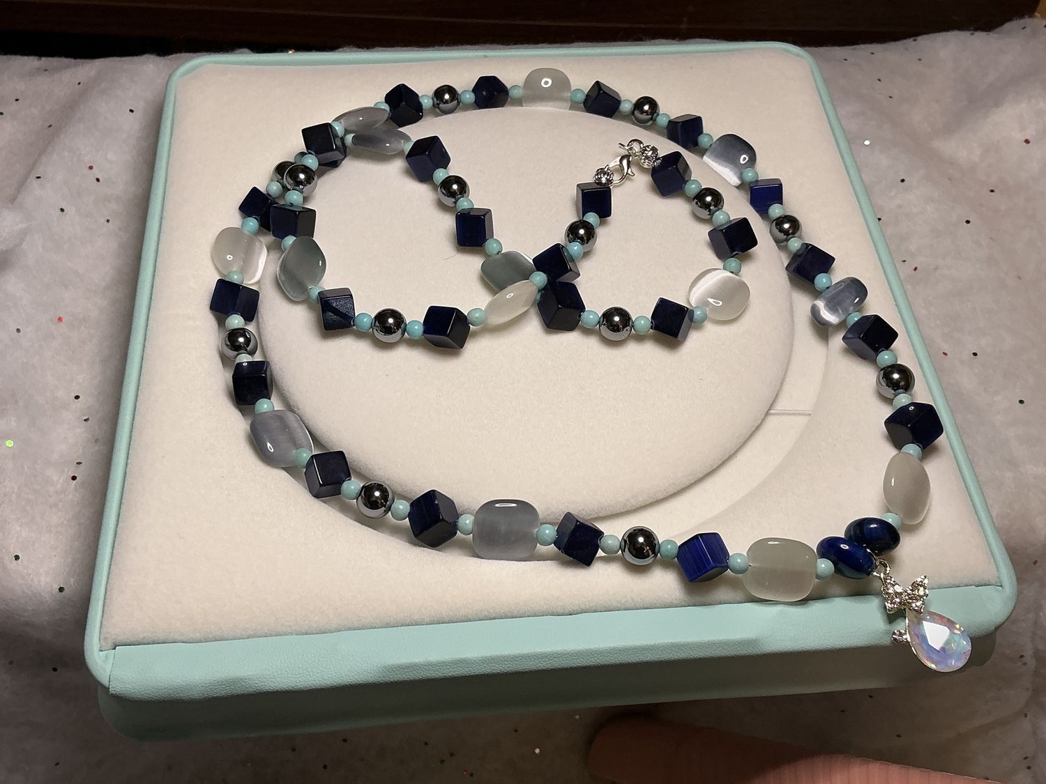 White Cat Eye with blue squares -HETZ beads