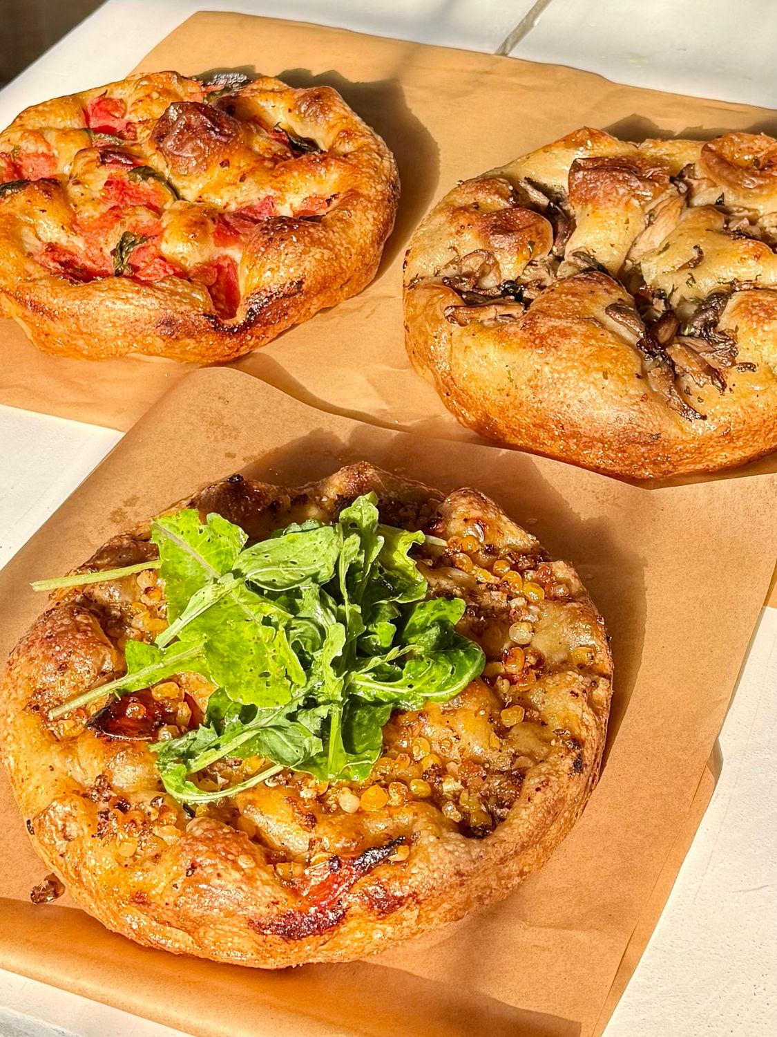 Focaccia, weekly farmers market (roasted corn, arugula with cumin vinaigrette)