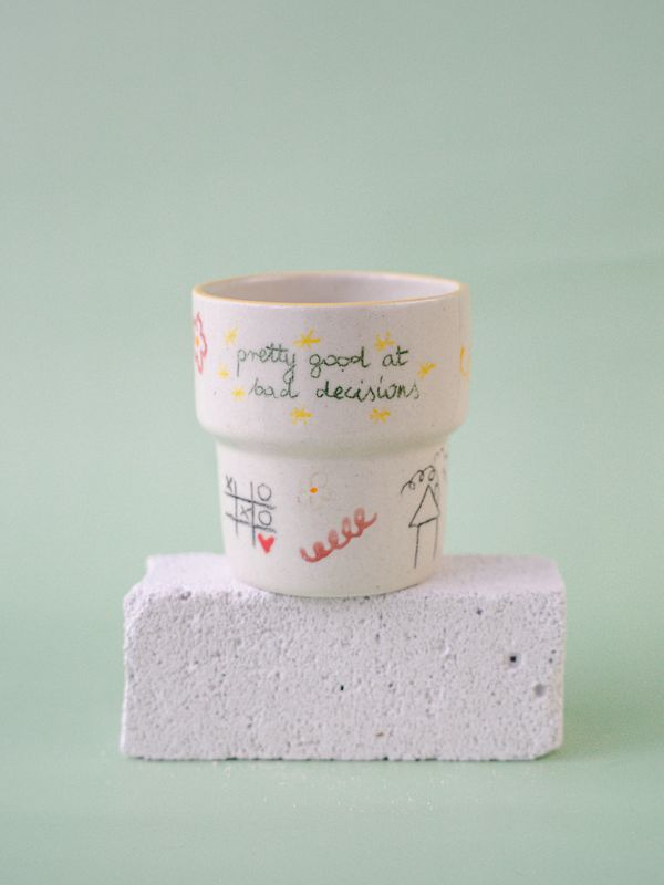 Niesforny Kubek "Pretty good at bad decisions"