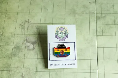Enamel Pin - Mystery Dice Goblin - Rainbow Dungeon Meowster
