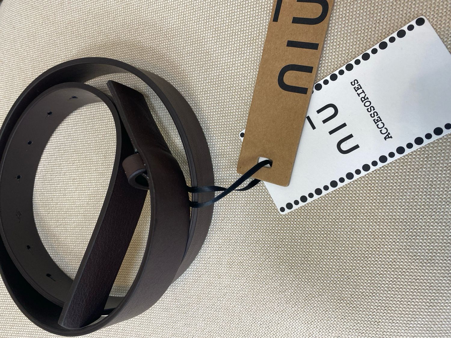 Riem Bruin AW26C59N002 - Niū