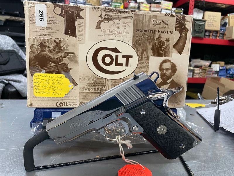 Colt Officers Model MK IV Series 80, 45 acp, 3 1/2 inch , 2 mags,Bright Stainless, factory enhanced, 1994, original box and papers. Beautiful gun! Colt Officers Model MK IV Series 80, 45 acp, 3 1/2 inch , 2 mags,Bright Stainless, factory enhanced, 1994, original box and papers. Beautiful gun!