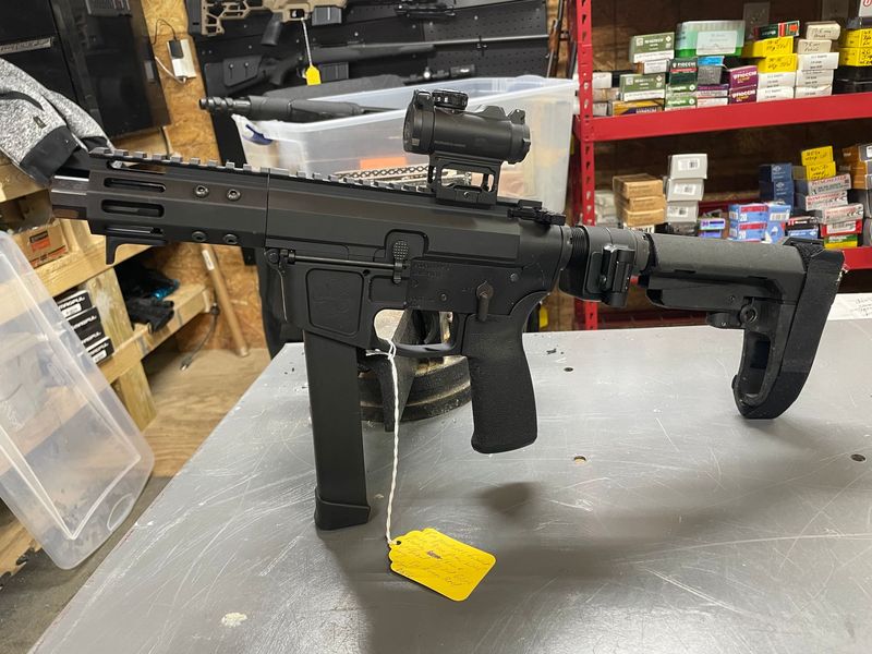 Foxtrot Mike 9mm AR pistol, 4 inch, Glock mags, Sig Romeo Red Dot, side folding brace, note cannot be fired with brace folded. 1 31 round mag included Foxtrot Mike 9mm AR pistol, 4 inch, Glock mags, Sig Romeo Red Dot, side folding brace, note cannot be fired with brace folded. 1 31 round mag included