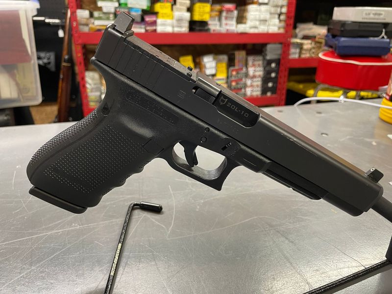 Glock Model 40, 10mm Long Slide, 2017, 2, 15 round mags, Lone Wolf barrel, very good condition, some storage scratches Glock Model 40, 10mm Long Slide, 2017, 2, 15 round mags, Lone Wolf barrel, very good condition, some storage scratches