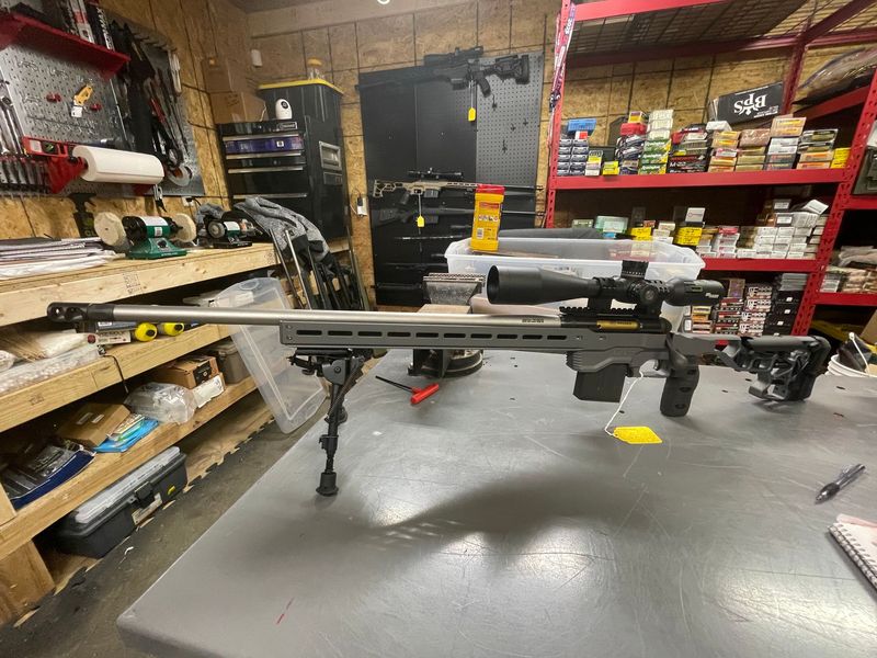 Savage Model 110, New with box, 6mm Creedmoor, 24 inch stainless with brake and bipod. Left Hand Bolt. Sig 4-24x50 Tango4 scope