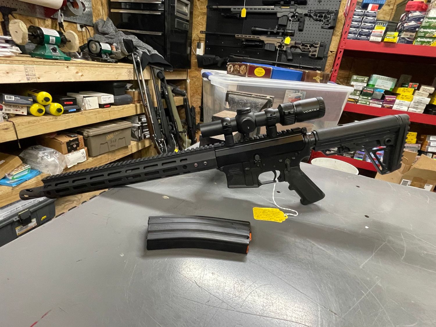 Palmetto State Armory, 50 Beowulf AR 15, 16 inch, muzzle brake, collapsible stock, 1 mag, Vortex 1-8x24 scope, very good condition, with scope.