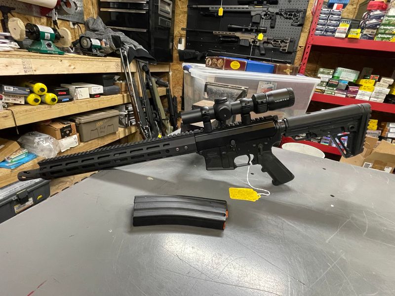 Palmetto State Armory, 50 Beowulf AR 15, 16 inch, muzzle brake, collapsible stock, 1 mag, Vortex 1-8x24 scope, very good condition, with scope.