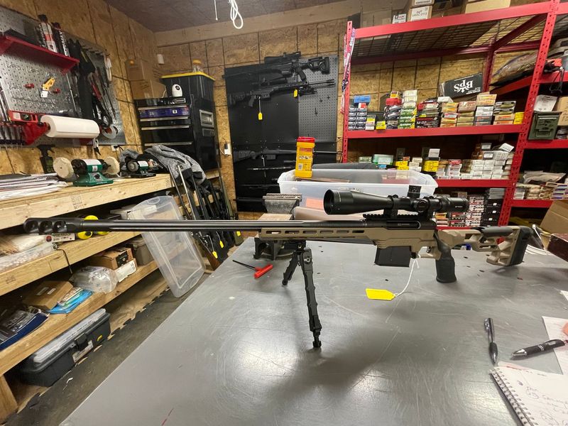 Savage Model 110, New with box. 338 Lapua, FDE, 24 inch with brake and bipod. Left Hand Bolt. Vortex Viper 6-24x50 scope