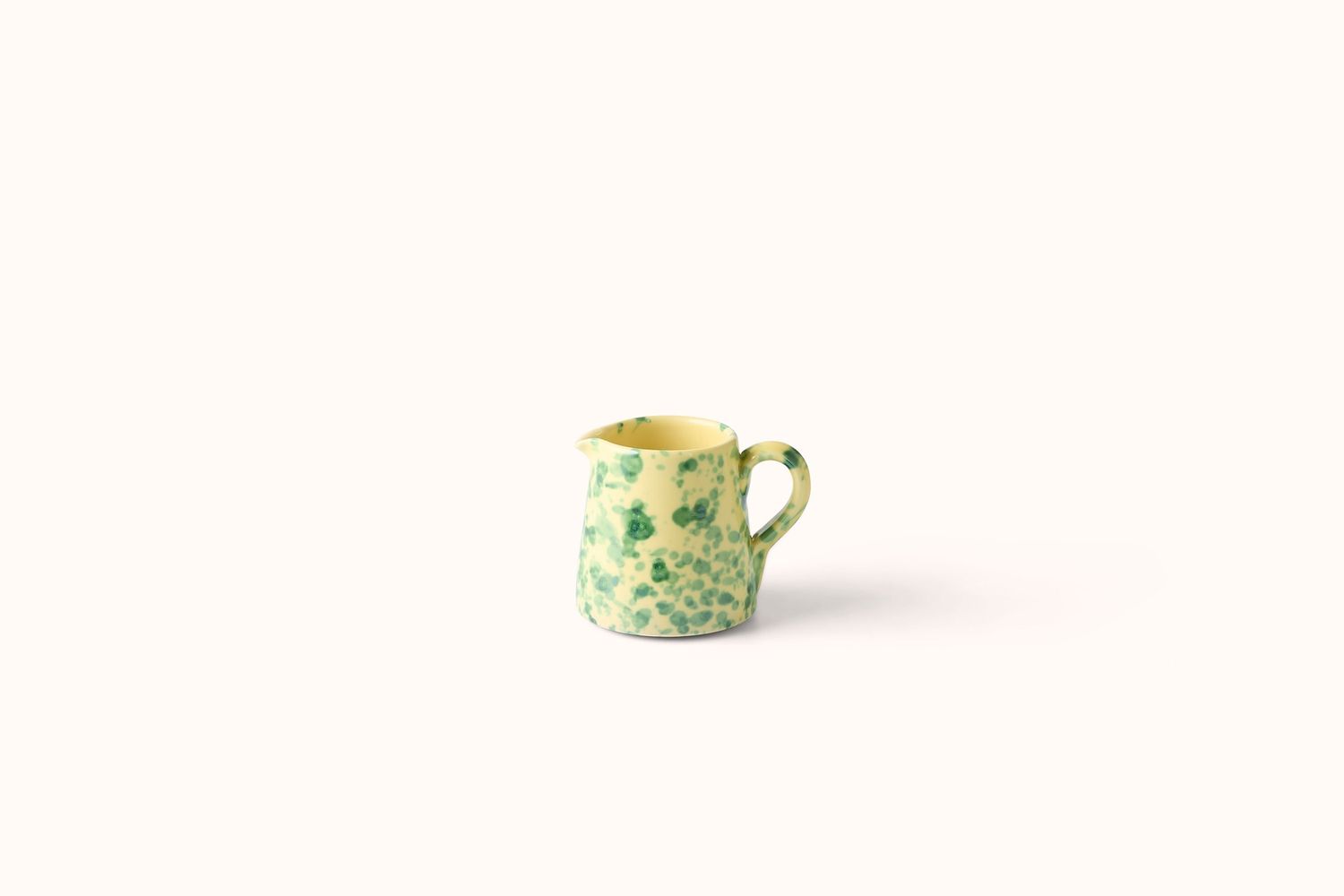 GREEN ON YELLOW SPLATTERWARE CREAMER