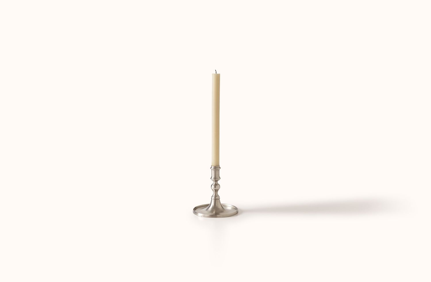 MATCH PEWTER ROUND RIMMED BASED CANDLESTICK