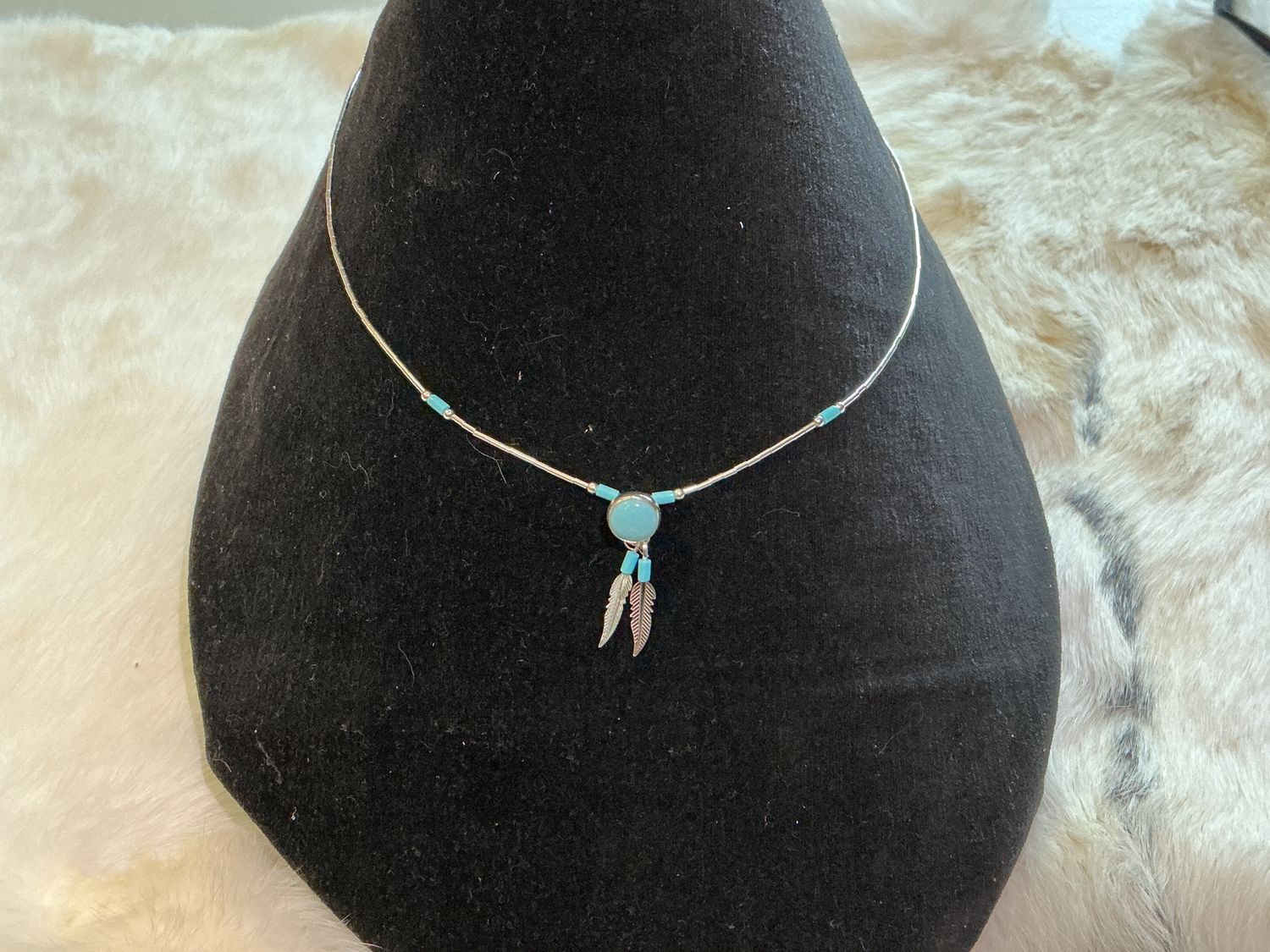 Sterling silver double feather turquoise pendant