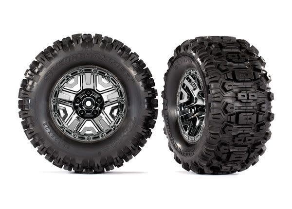 Traxxas Tires &amp; wheels, assembled, glued (black chrome 2.8" wheels, Sledgehammer tires, foam inserts) (2) (TSM rated)