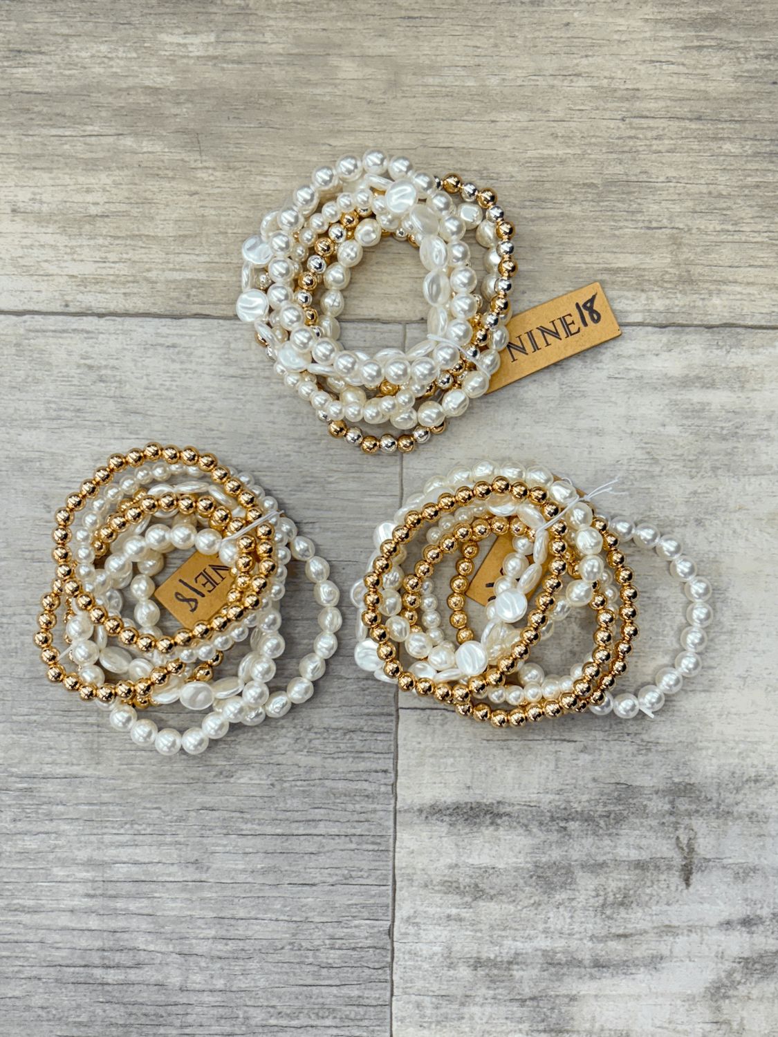 Nine Pearl and Gold Bracelet Set