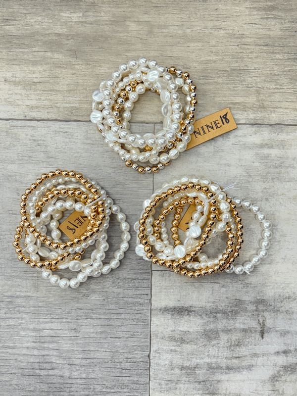 Nine Pearl and Gold Bracelet Set