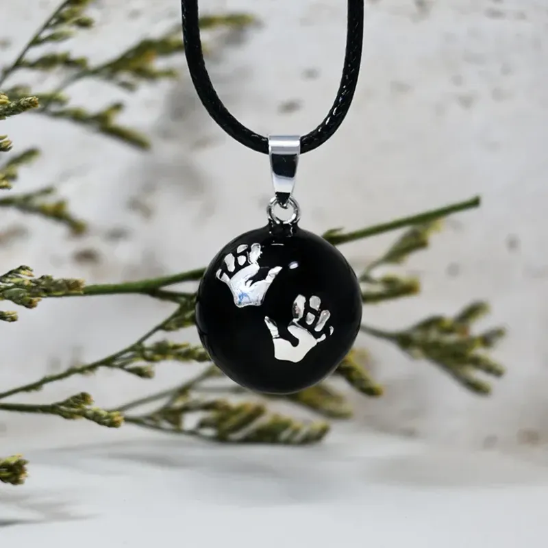 Bola de grossesse noir lisse motif argent mains "Elise" - Irréversible Bijoux