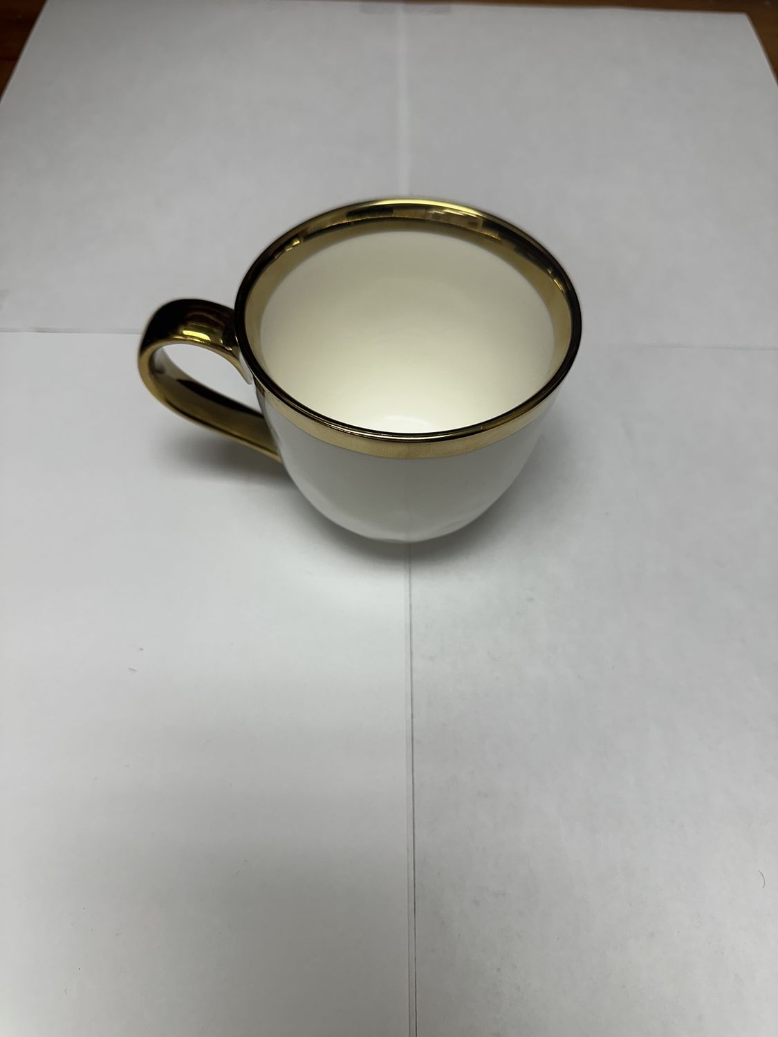 White Teacup w/t Gold Rim