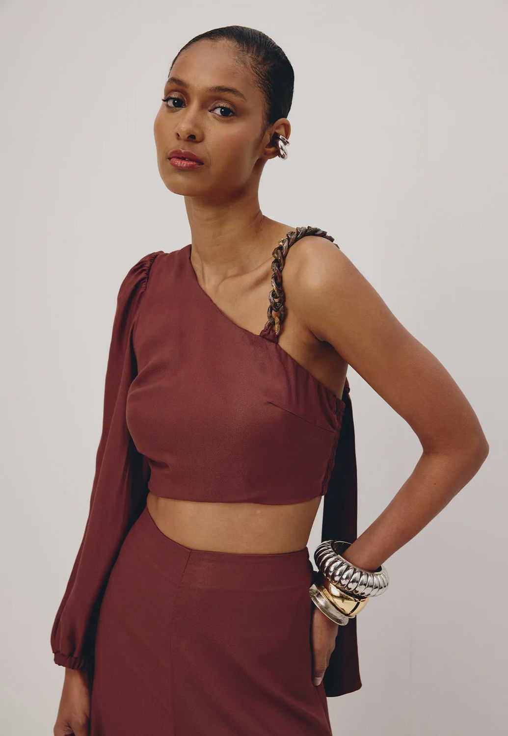 CHOCOLATE SIDE CUT AND CHAIN DETAIL JUMPSUIT