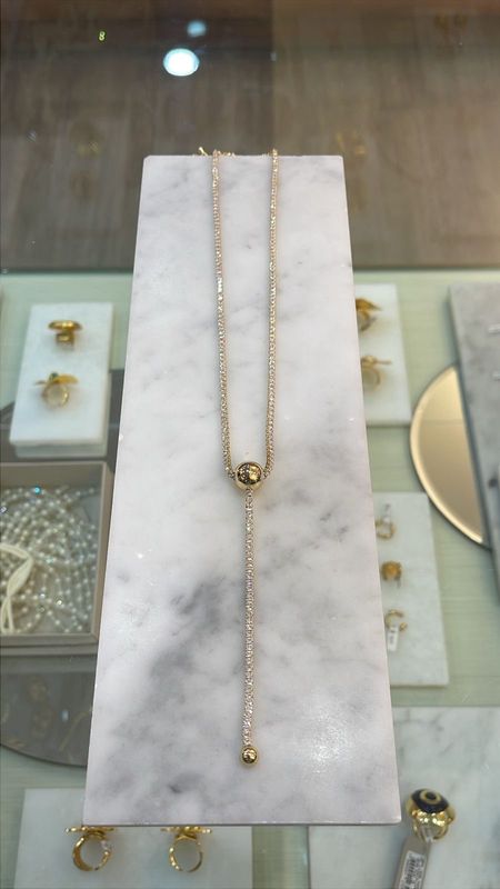 GOLD CRISTAL NECKLACE WITH A CENTER BALL