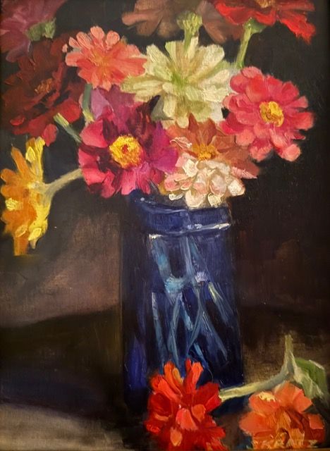 Zinnias in Blue Glass
