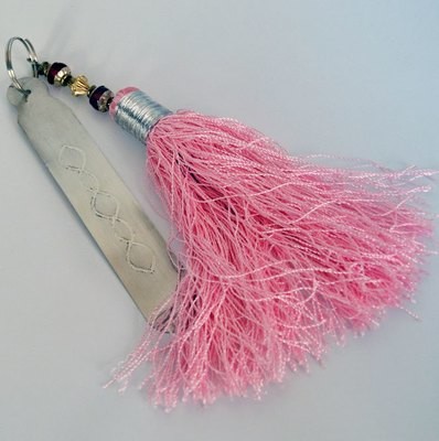 Boekenlegger zilver met een roze kwast