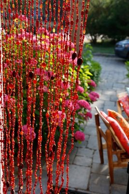 glaskralen gordijn 40 strings rood-oranje + reservestreng en gratis embrasse