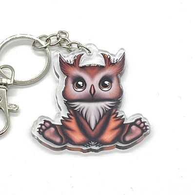 Skittles the Owlbear acrylic charm keychain, zipper clip