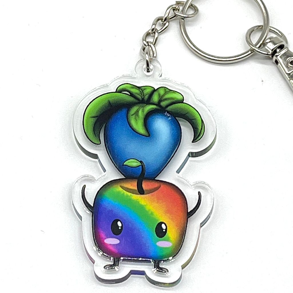 Prismatic Junimo acrylic charm keychain, zipper clip
