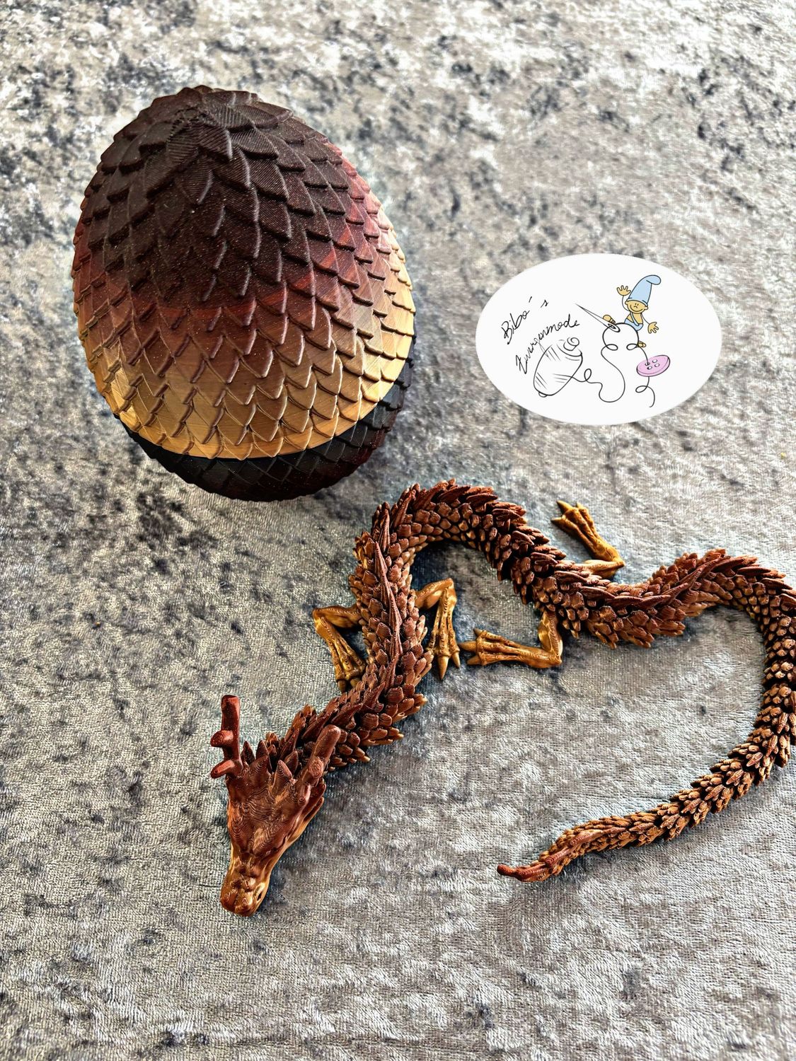 Drache + Ei gold braun