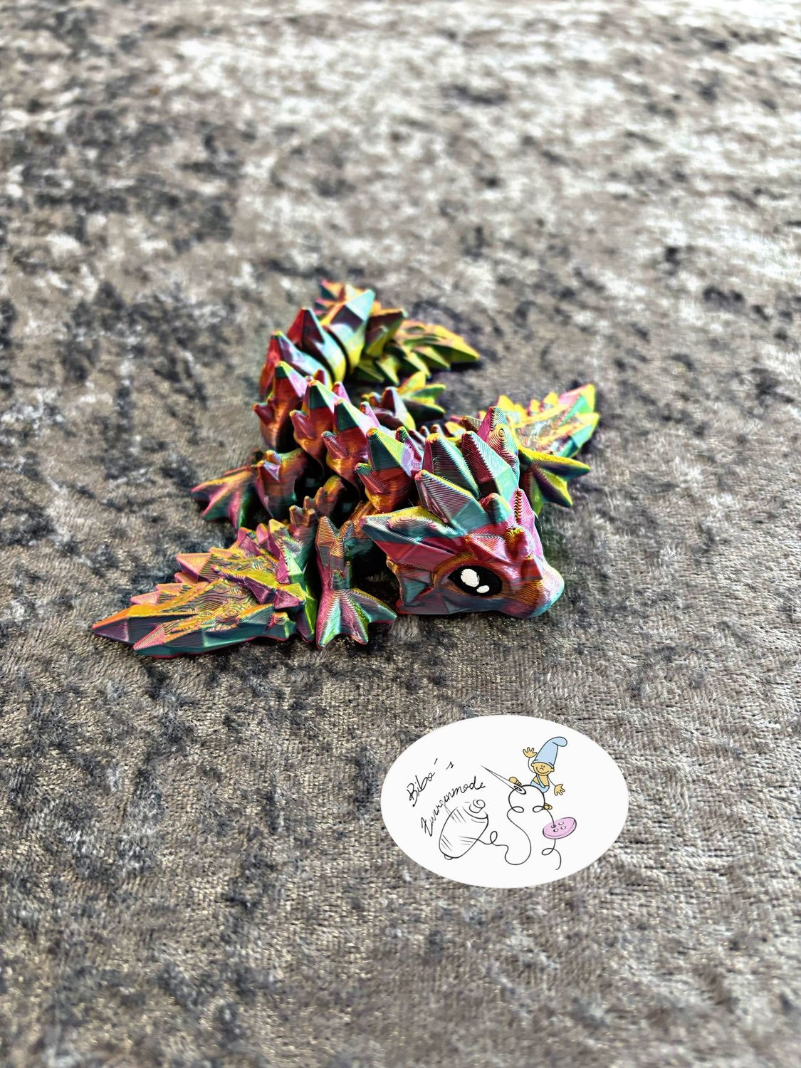 Drache mit Flügel rosa türkis