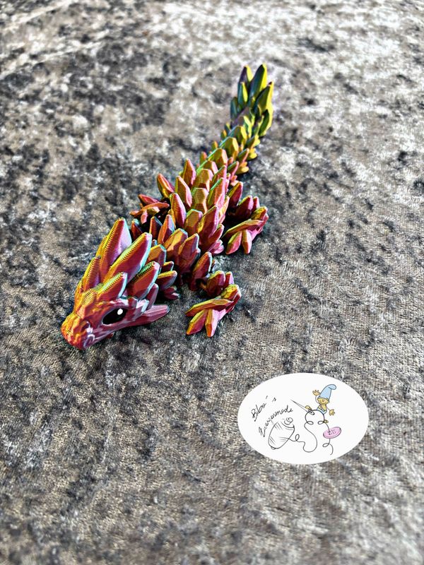 Drache klein rosa grün