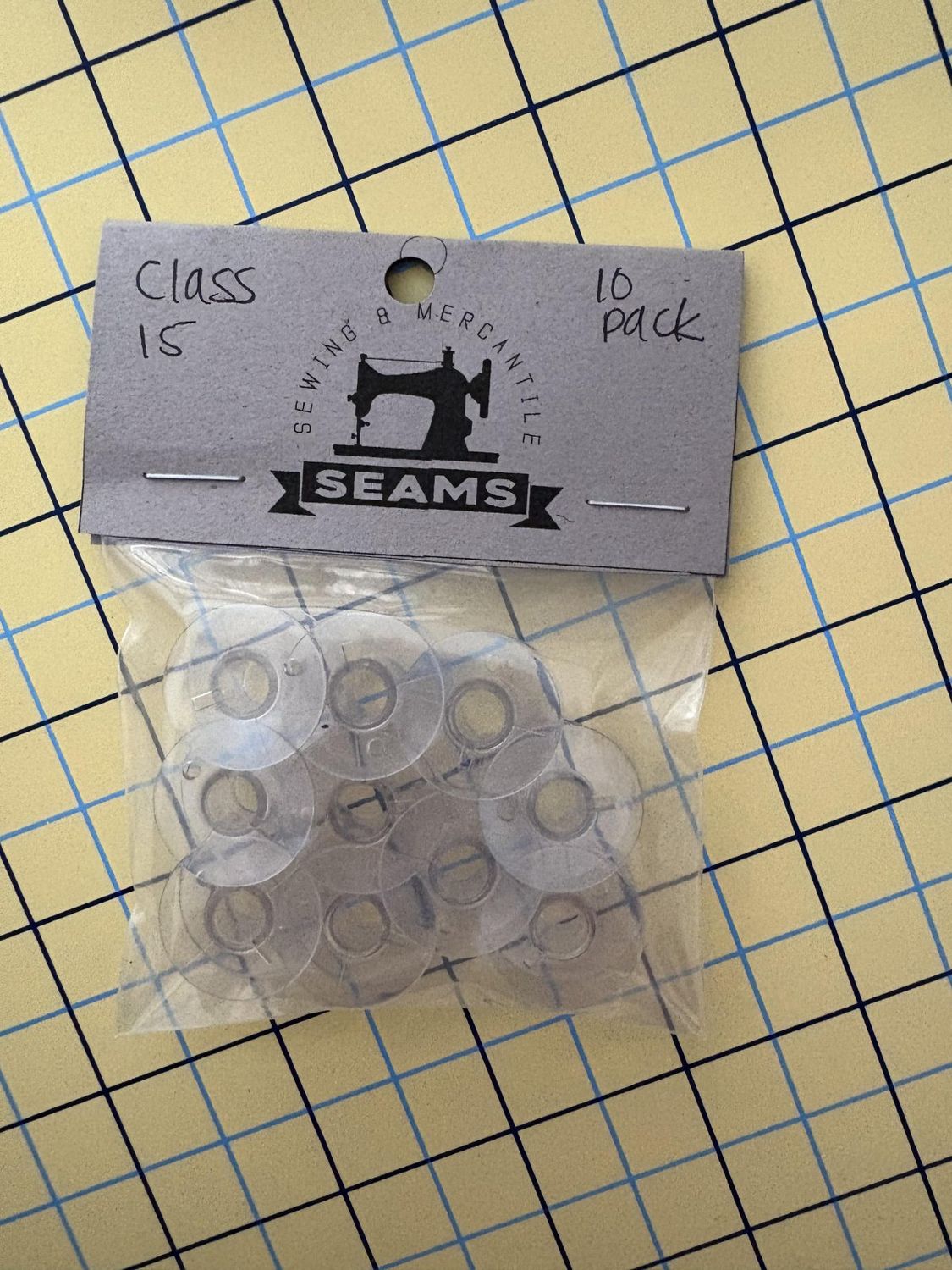 Plastic Class 15 Bobbins 10 pack